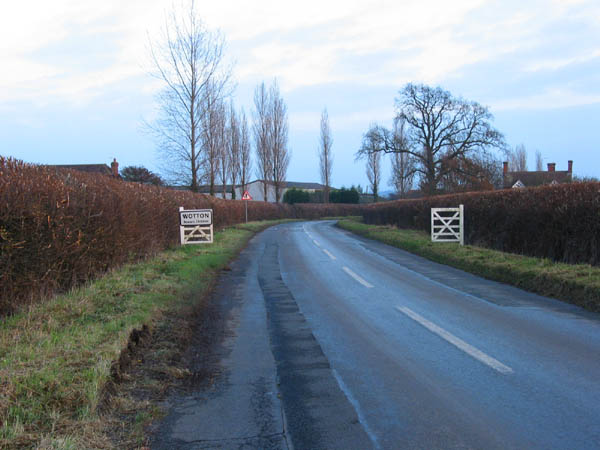 [PHOTO: wintry scene with road and hedgerows: 47kB]