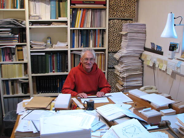 [PHOTO: Roger Griffin at his desk: 57kB]