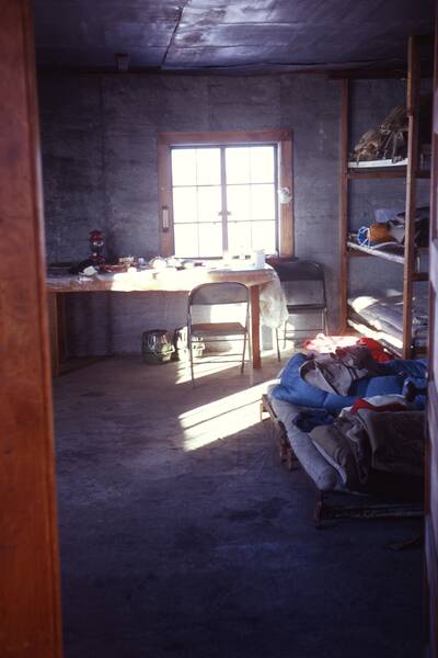[PHOTO: Interior of summit hut: 27kB]