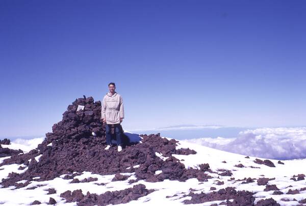 [PHOTO: Roger at a summit cairn: 29kB]