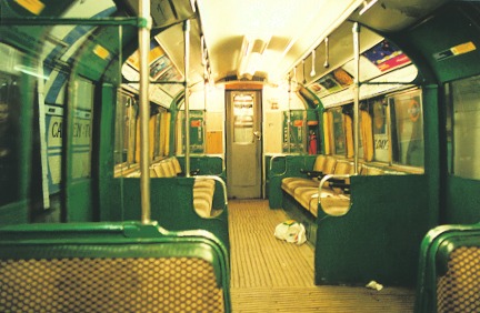 [PHOTO: Interior of Heritage tube train, in tunnel: 51kB]