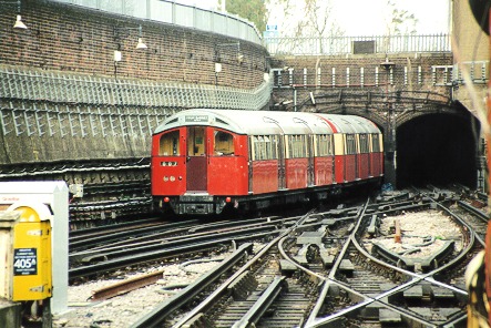 [PHOTO: Heritage train disappearing into tube at Morden (day): 77kB]
