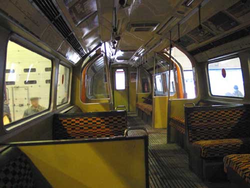 [PHOTO: interior of 1983 tube stock saloon (83kB)]