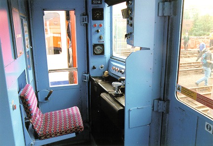 [PHOTO: A stock cab interior, wide view in daylight: 53kB]